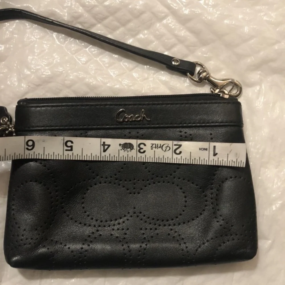 Coach signature perforated c wristlet bag